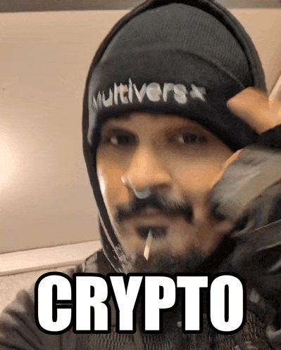 a man with a beard wearing a hat that says multiverse