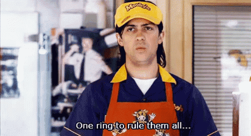 a man wearing a yellow hat and apron says one ring to rule them all