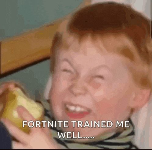 a young boy is eating an apple and making a funny face while playing fortnite .