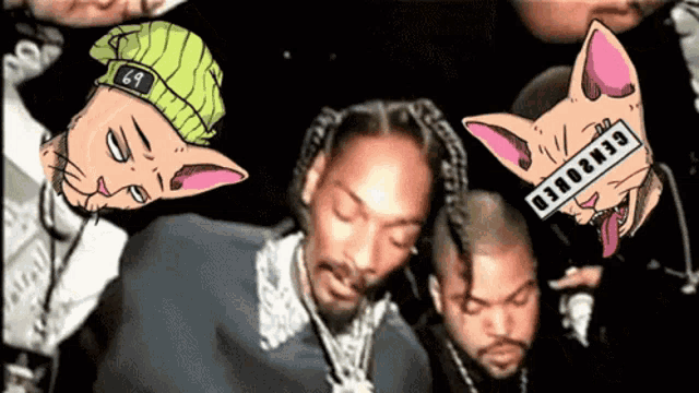 snoop dogg and ice cube are surrounded by cartoon cats